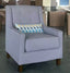 Sally Premium Armchair covered in Plain Vinyl Fabric with Beech coloured legs