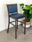 Hudson Bar Stool. Faux Leather Seat. Backrest in Blue fabric. Moisture resistant Seat. wipeable, comfortable, contemporary. 10 Year frame warranty