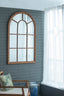 Coolum Arched Wall Mirror.  This decorative wall mirror boasts an oversized arched silhouette and a natural brown frame