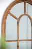Coolum Arched Wall Mirror.  This decorative wall mirror boasts an oversized arched silhouette and a natural brown frame