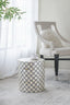 Geometric Patterned Stool. Can serve as either an end table or a stool. Convenient and contemporary, you will have no trouble finding a spot for this