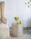 Geometric Patterned Stool. Can serve as either an end table or a stool. Convenient and contemporary, you will have no trouble finding a spot for this