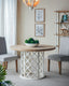 Lattice Farmhouse Dining Table ( Flat Pack For transport) Aged Plywood top and a round pedestal base embellished with mesmerizing cut-out patterns.