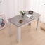 Grey Rectangular Dining Table with 4x Green Velvet Chairs